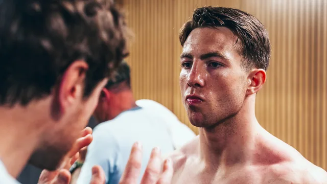 A close portrait of Pierce O’Leary during fight preparation