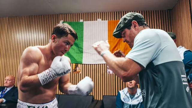 Pierce O’Leary warming up with his coach backstage