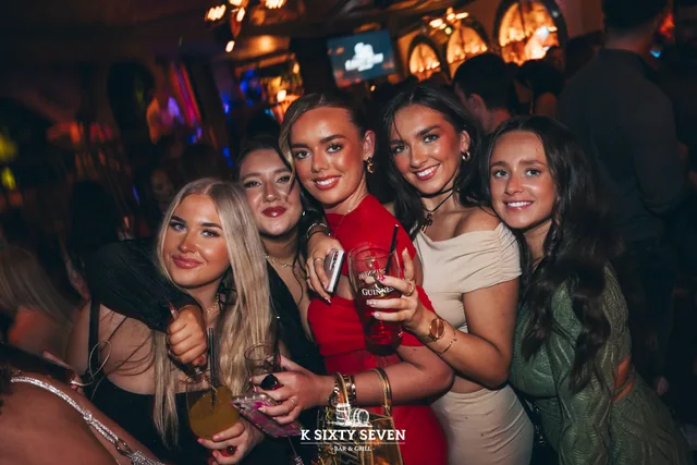 A group of guests enjoying an evening at K Sixty Seven