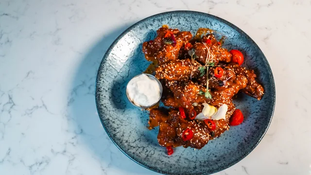 An overhead food photograph on a pale marble table