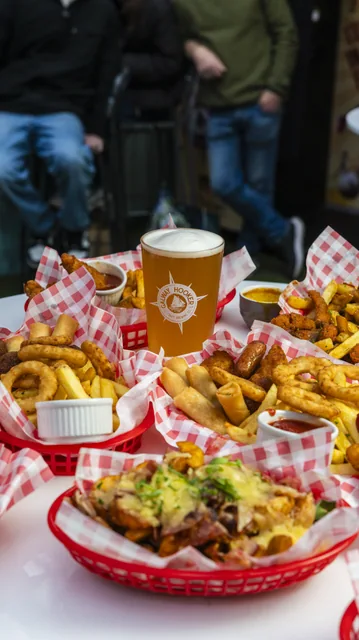 A colourful spread of food and drinks on a table